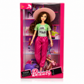 Fashion Doll with Pink Hat – Girl Power Edition | دمية أزياء "Girl Power" مع قبعة وردية
